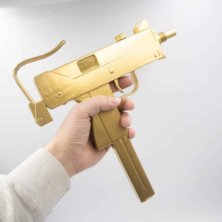 Golden uzi prop replica 9