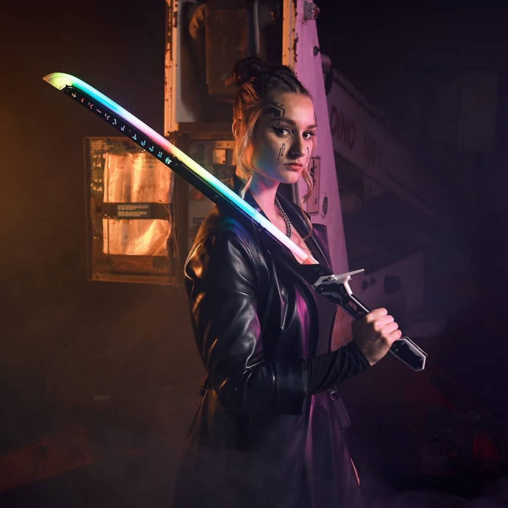 A cosplayer holding a custom RGB katana