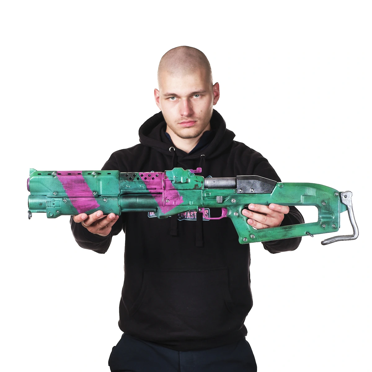 A fan holding a custom painted rifle